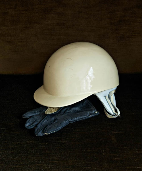 Sir Stirling Moss’ helmet and gloves photographed at his house in London by Tom Mannion