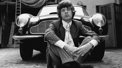 The image of Mick Jagger in front of his beloved DB6 epitomises the decade that signaled a seismic change in British society