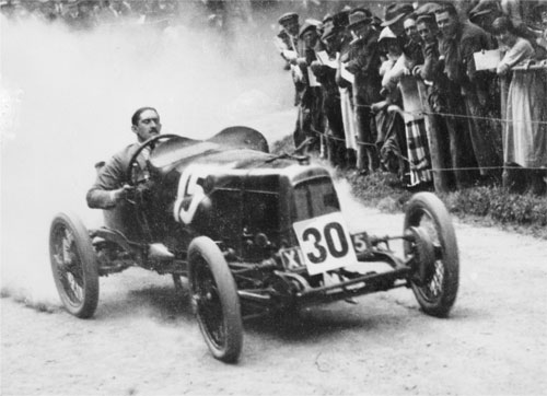 Count Louis Zborowski drives an Aston Martin Strasbourg, originally built for the 1922 French Grand Prix