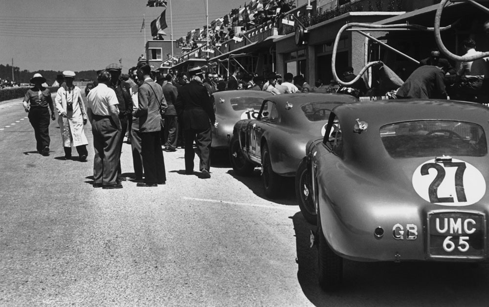 Aston Martin DB2s line the pits at the Le Mans 24-hour race in 1949