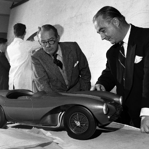 David Brown here in 1954 with Aston Martin designer Frank Feeley, buys the company in 1947