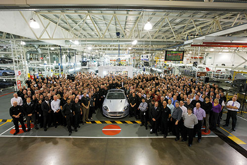 Aston Martin's workforce celebrates as the 50,000th car rolls off the production line