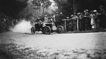 Having started life in hill climbs, the Aston Martin name is synonymous with motor racing and a sporting approach and attitude, which still thrives today among its customers and partners